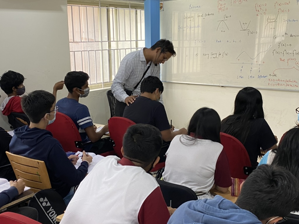 Akhil Sir engaging with students in a Mathematics class